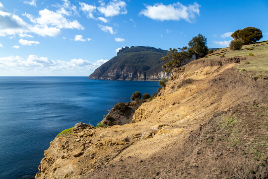 Rugged coastal cliffs and headlands of Maria Island in Tasmania