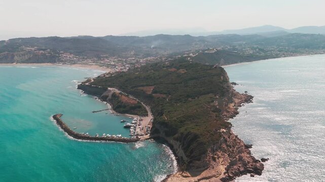 Aerial Pan Over Cape Kefali Cliffs Between Agios Stefanos and Arillas Bay Corfu Greece