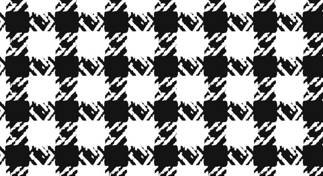 Distressed black and white houndstooth pattern textile background with a stylish retro abstract design.