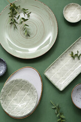 Fototapeta premium Beautiful table setting on green background