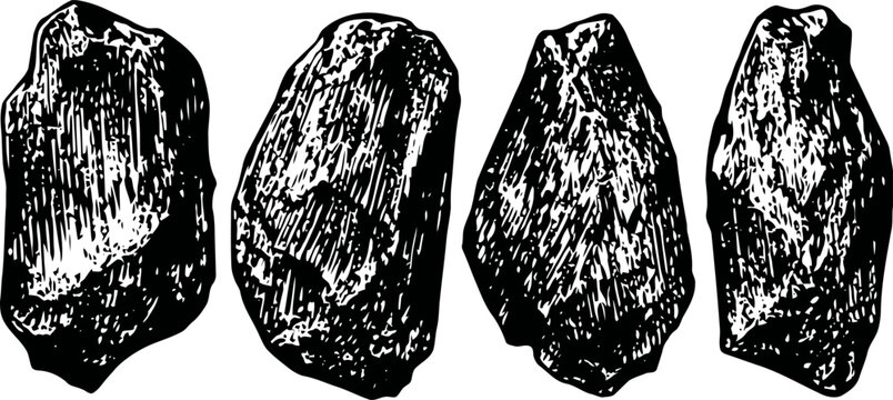 Set of four primitive stone tools or hand axes with rough edges and textured surfaces