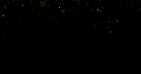 Golden bokeh lights sparkle gently in soft abstract scene. Luxury glitter dust forms festive elegant design. Warm glow adds celebration magic feel.  © dedstock