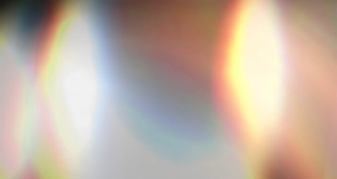 Dark cinematic prism light leak overlay abstract background. RGB spectral glow with red, blue and amber highlights. Soft blur diffusion, lens flare bloom, film burn effect.