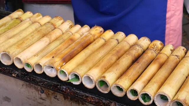 Sweet sticky rice with coconut milk in bamboo joints (Khao Lam), Thailand&rsquo;s traditional snack