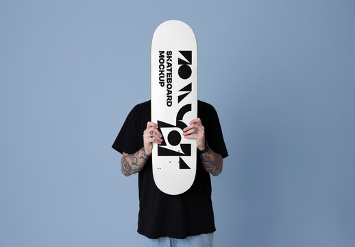Hand Holding Skateboard Mockup