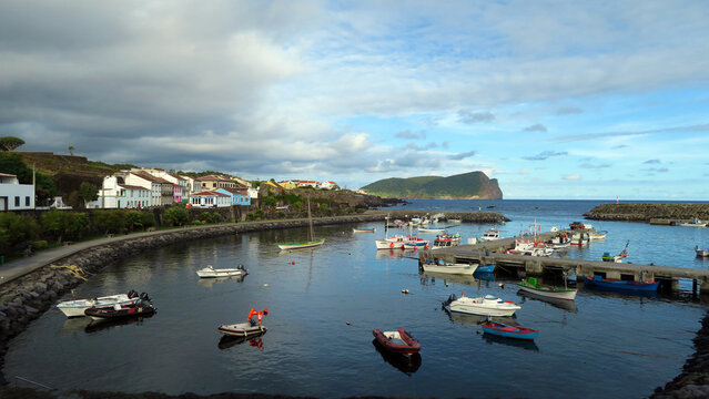 S&atilde;o Mateus da Calheta, Terceira Island, Portugal. View of S&atilde;o Mateus da Calheta Bay filled with boats and Ilh&eacute;u das Cabras on the background