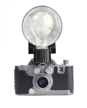 Vintage film camera isolated on white background