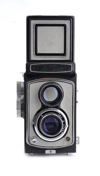 Vintage film camera isolated on white background