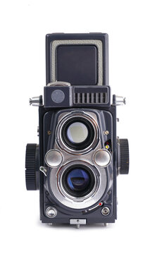 Vintage film camera isolated on white background