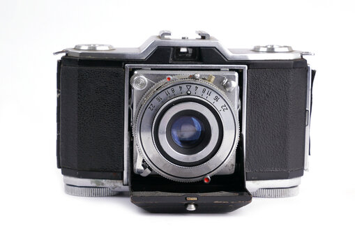 Vintage film camera isolated on white background