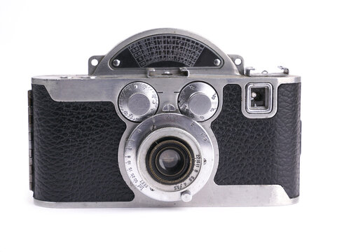 Vintage film camera isolated on white background