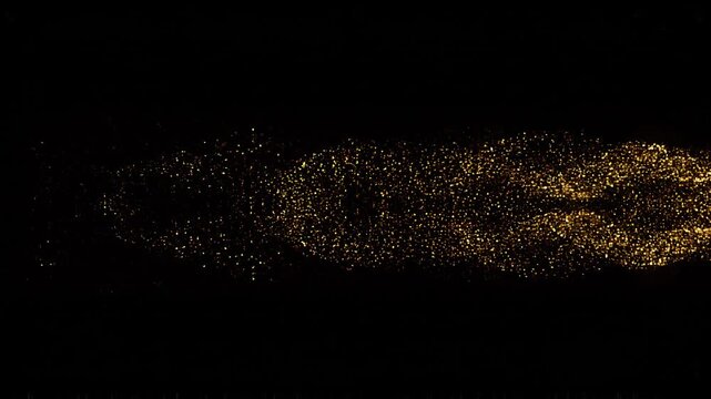 Minimalist golden particle wave flowing in darkness with subtle glow elegant abstract motion background luxury shimmer dust stream for premium design and modern visuals