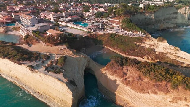 Drone Rise and Pull Out Over Kanali tou Erota Rocks and Ionian Sea in Sidari Corfu