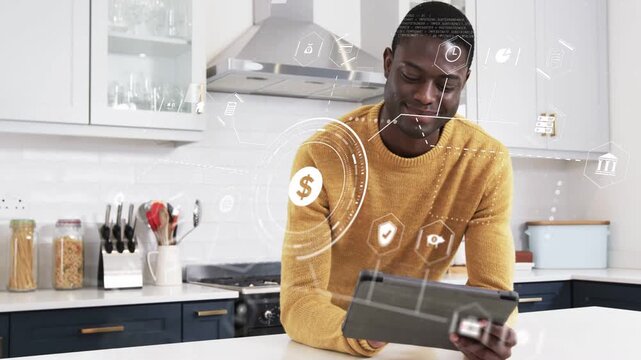 Man leaning on kitchen tapping tablet, starting finance overlays, checking savings via dollar chart
