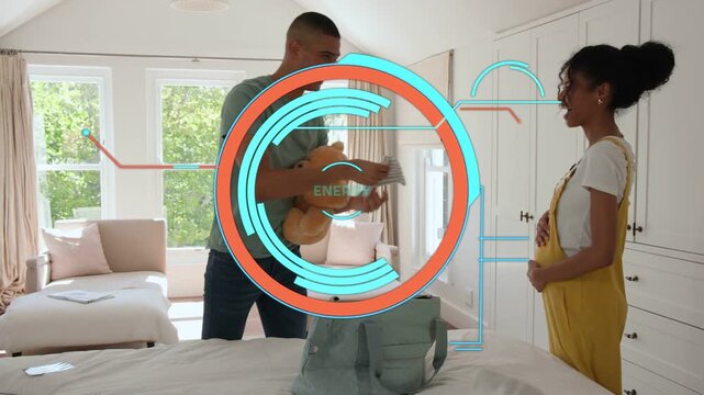 Expectant couple packing mint-green bag prepping for baby, technology HUD overlaying progress rings