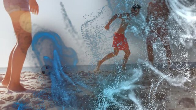 Friends running to soccer-ball on beach, particles drifting across players revealing sea for sports