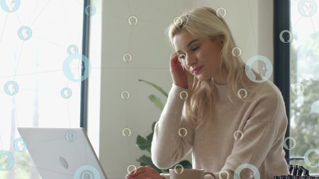 Woman typing on laptop for remote work causing circular overlays hiding face, pausing, looking out