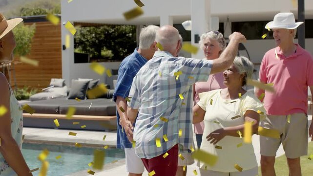Bald man hugging seniors poolside hug releasing gold confetti falling around, celebrating event ads