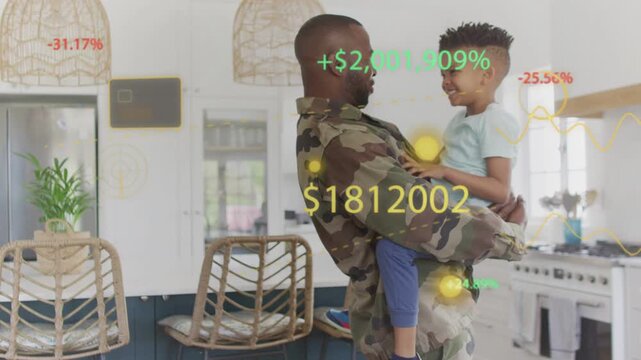 Father lifting and holding child in kitchen, bonding while finance HUD updating numbers around them