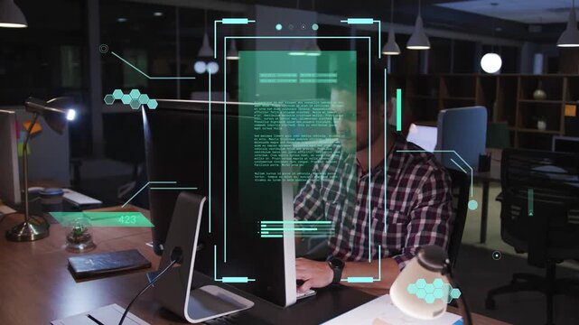 Tech developer reviewing monitor content, typing, holding phone while HUD overlaying face in office