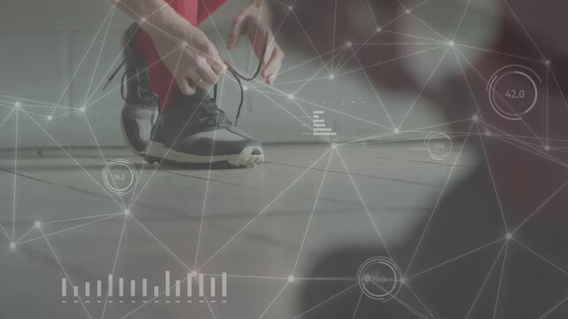 Male athlete reaching down, tying running shoe for fitness test, HUD nodes mapping biometric data