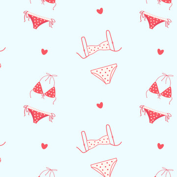 Seamless pattern with pink bikinis and hearts on light blue background. Summer beach texture for tropical holiday and textile design