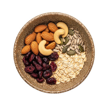 Assorted mixed nuts and seeds in a bowl isolated on transparent background