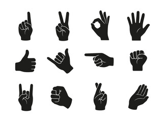 Fototapeta premium Black hand silhouette icons collection in cartoon style. Set of hand gestures black silhouettes isolated