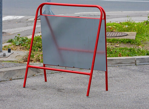 Background of empty metal plate outside on a city street