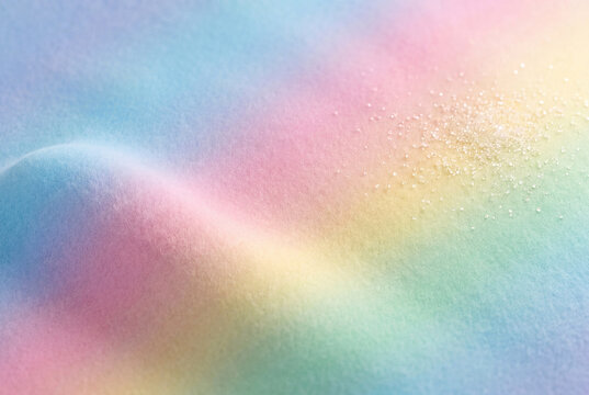 Pastel gradient background with shimmering particles