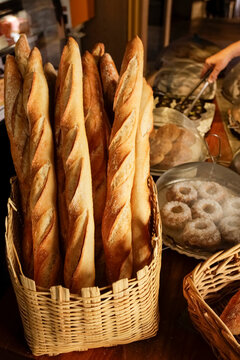 French baguettes in basket at bakery counter