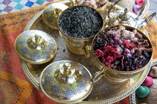 Marrakech, Morocco Tea set with herbs, flowers and spices