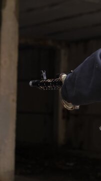 Close up of assault rifle firing with bright muzzle flash