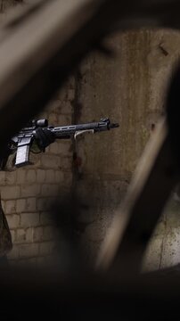 Soldier performing tactical shooting drill in abandoned building