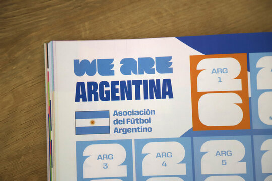 
Official sticker album for the 2026 FIFA World Cup. Argentina national soccer team. Empty space for player and team stickers. Panini Group. Collectible sticker album.