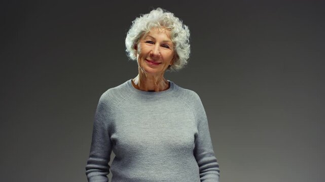Mature woman portrait face, retirement female. Old lady with grey hair, have calm and relax. Smile, retirement and portrait of elderly senior person with laugh for funny joke, humor and carefree