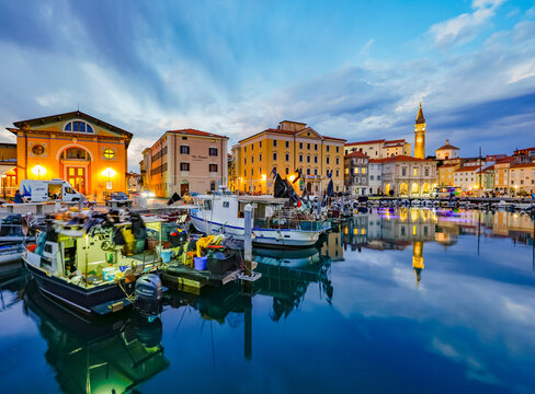 Sunset light over Piran harbour, one of Slovenia's major tourist attractions.	