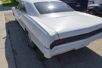 Fototapeta premium rear of a circa 1970 Chevrolet Nova being restored in Toronto