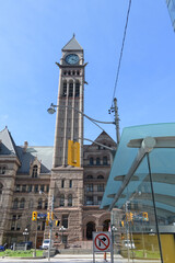 Obraz premium clock and bell tower at Old City Hall, viewed from Bay St near Queen St (bus stop), Toronto