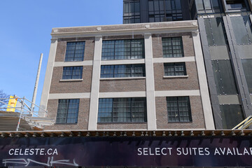 Naklejka premium exterior of Celeste Condominiums located at 121 George Street (corner of Richmond St E) under construction, Toronto