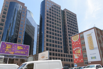 Naklejka premium roadside billboards at southwest corner of Church St and Bloor St E (behind: 175 Bloor Street East, an office complex), Toronto (Bear Paws, Honeycomb cereal, and IKEA)