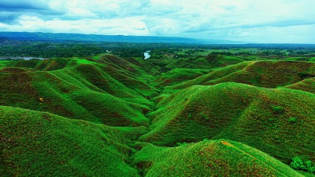 Rolling Grassland Savanna of Tanau Hill at Sunset, East Sumba, Indonesia