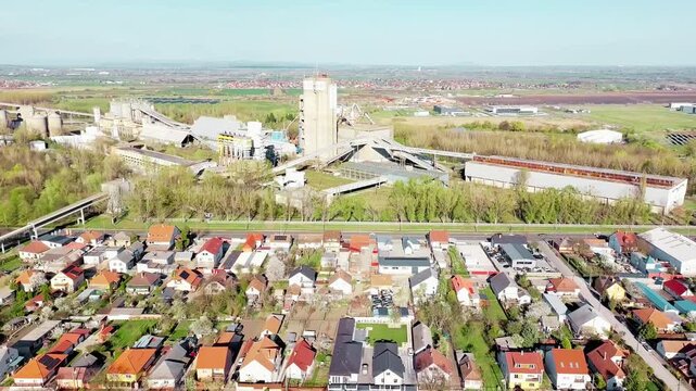 4K drone aerial view showcasing stunning architectural structures from above, highlighting modern design, urban planning, and geometric building patterns in cinematic motion.