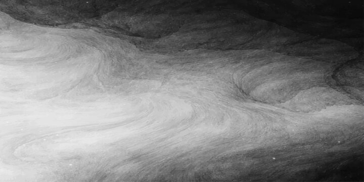 An abstract black and white background with water drops creates a cold winter texture of ice and snow over a grunge stone wall in this dark nature landscape