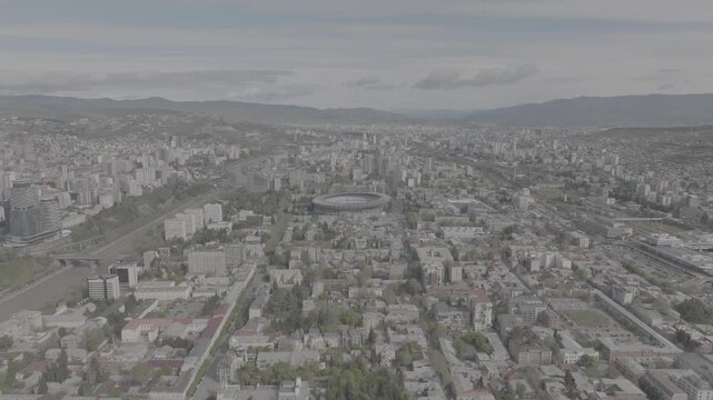 tbilisi, georgia, city, aerial, drone, skyline, panorama, urban, buildings, streets, stadium, dinamo, dinamo arena, cityscape, travel, tourism, europe, capital city, architecture, traffic, movement, 