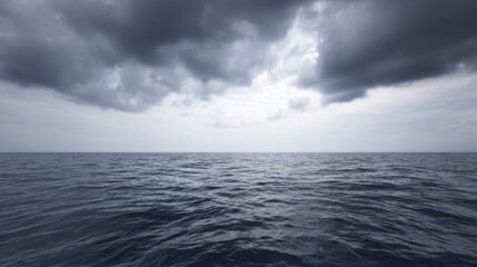Obraz premium latent. Vast calm ocean under a heavy dramatic sky before a storm, low horizon line. travel magazines, destination branding, designed for travel destination branding, used by architects. 