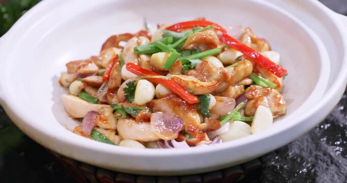 Classic and delicious casserole with scallions, bell peppers, and garlic chicken thigh meat