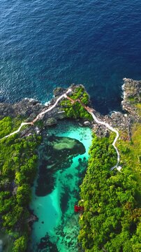 Weekuri Lagoon, Crystal Clear Saltwater Lake and Limestone Cliffs in Southwest Sumba