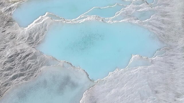 An aerial view of the Pamukkale Travertines. Pamukkale Travertines Drone Video, Pamukkale Denizli, Turkiye (Turkey)