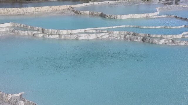  An aerial view of the Pamukkale Travertines. Pamukkale Travertines Drone Video, Pamukkale Denizli, Turkiye (Turkey)